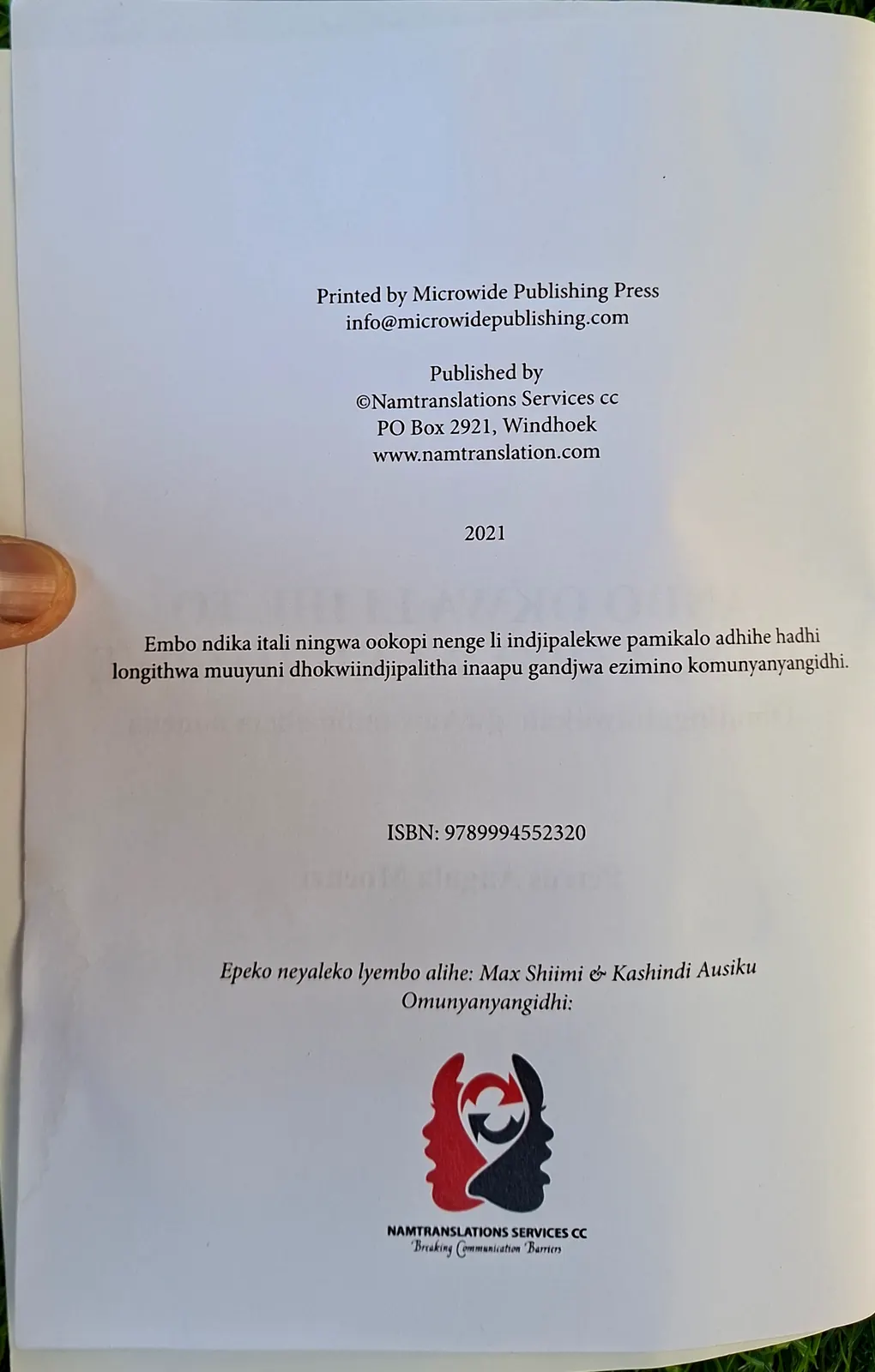 Colophon page with printer, publisher, year, ISBN, and illustrators.